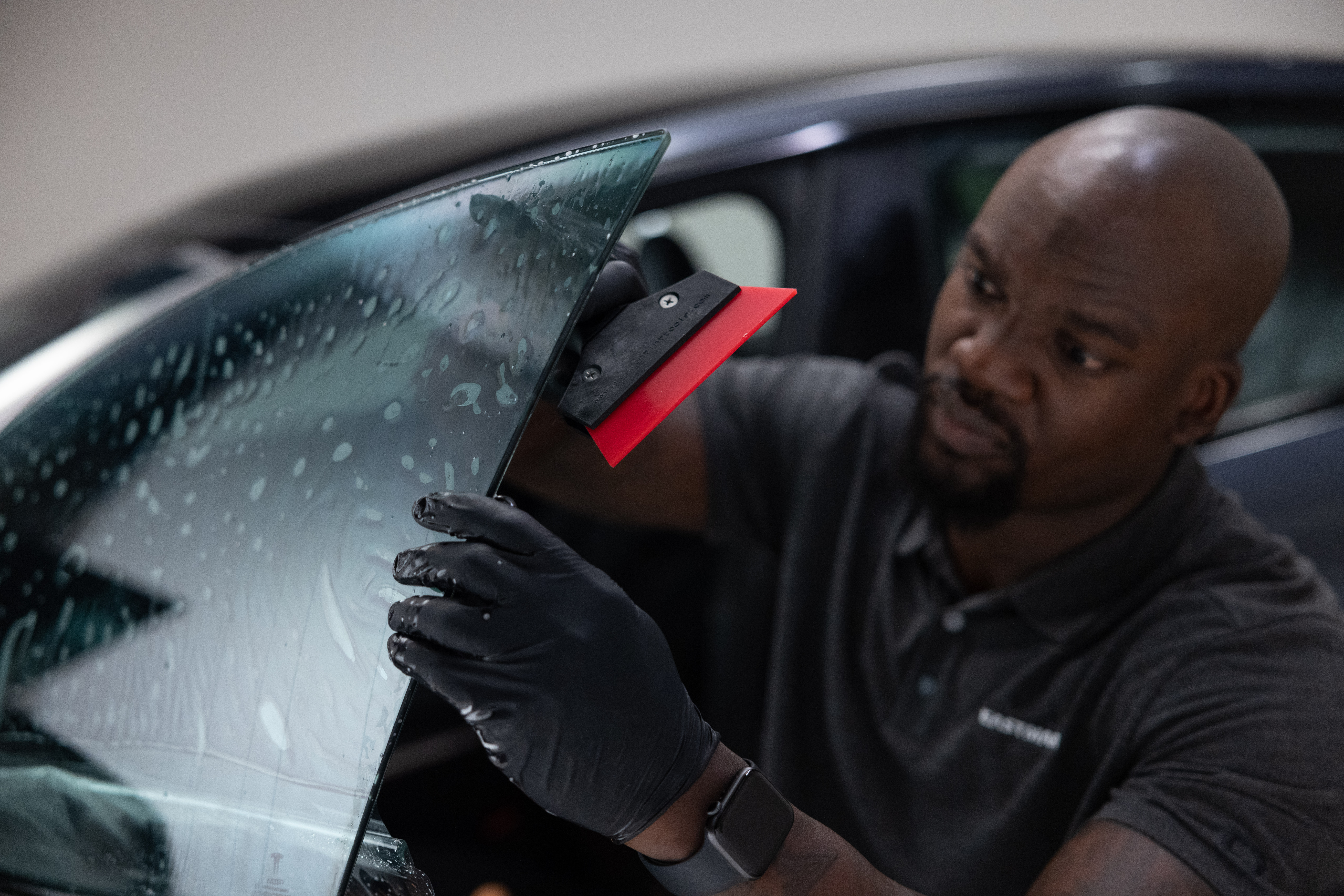 Tint Installer Working